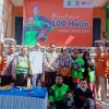 Rumah Zakat Distribusikan 100 Helm Kepada Driver Ojol Tangerang